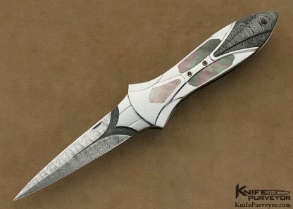 Ron Best Custom Knife Black Lip Pearl Interframe with Carved Mike Norris Stainless Damascus with Amethyst Accents Lockback