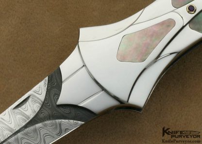 Ron Best Custom Knife Black Lip Pearl Interframe with Carved Mike Norris Stainless Damascus with Amethyst Accents Lockback - Image 2