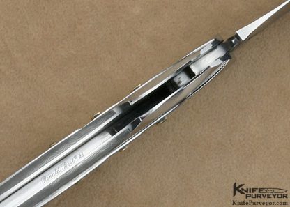 Ron Best Custom Knife Carved Damascus & Stainless Steel Black Lip Tahitian Pearl Interframe Lockback with 6 Emerald Settings - Image 7