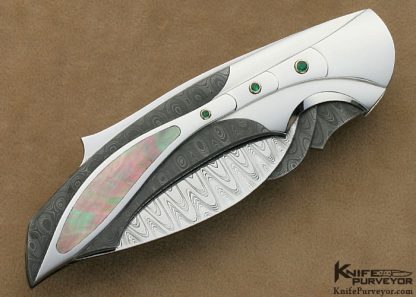 Ron Best Custom Knife Carved Damascus & Stainless Steel Black Lip Tahitian Pearl Interframe Lockback with 6 Emerald Settings - Image 4