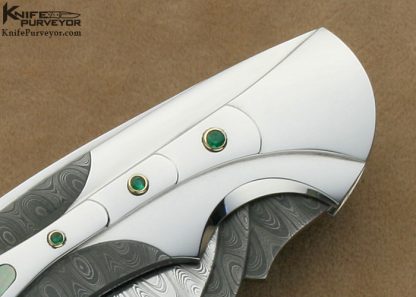 Ron Best Custom Knife Carved Damascus & Stainless Steel Black Lip Tahitian Pearl Interframe Lockback with 6 Emerald Settings - Image 5