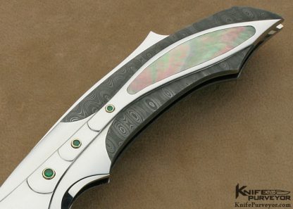 Ron Best Custom Knife Carved Damascus & Stainless Steel Black Lip Tahitian Pearl Interframe Lockback with 6 Emerald Settings - Image 3