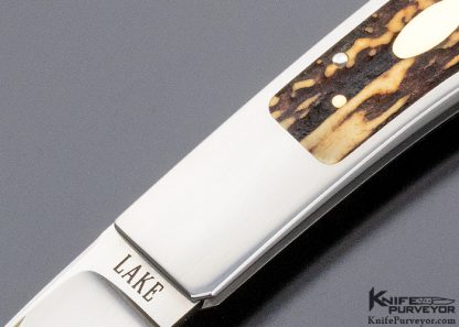 Ron Lake Custom Knife 2007 AKI Catalog Cover Knife Tail Lock with 14 Kt Gold Tab Release Stag Double Signature and Double Gold Escutcheons Double Nail Nick - Image 2