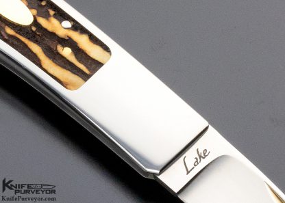 Ron Lake Custom Knife 2007 AKI Catalog Cover Knife Tail Lock with 14 Kt Gold Tab Release Stag Double Signature and Double Gold Escutcheons Double Nail Nick - Image 4