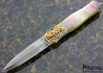 Ron Skaggs Engraved Owen Wood Custom Knife Chevron and Twist Damascus Black Lip Pearl Liner Lock