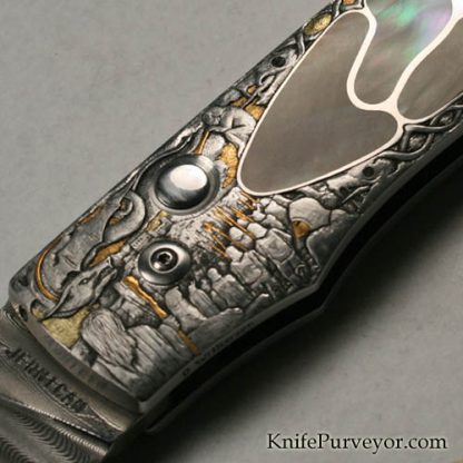 Steve Jernigan's Custom Knife: Blacklip Pearl Multiple Inlaid Automatic with Mike Norris Stainless Damascus Blade Engraved by Dan Wilkerson - Image 4