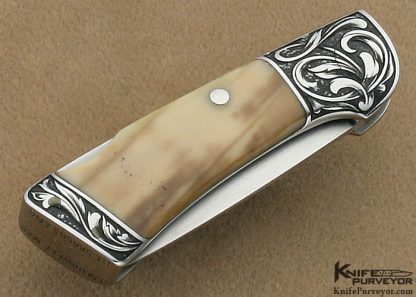 T.M. Dowell Custom Knife Fossilized Walrus Ivory Lockback Engraved by Ron Skaggs - Image 3
