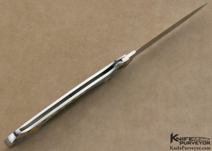 Tom Overyender Custom Knife Black Lip Tahitian Pearl Shell Interframe Lockback Engraved by Ray Cover Jr. - Image 9
