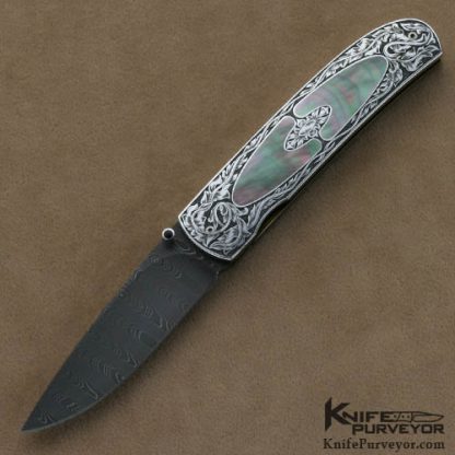 Andre van Heerden Custom Knife Blacklip Pearl Interframe Linerlock Engraved by Helen van Wyck