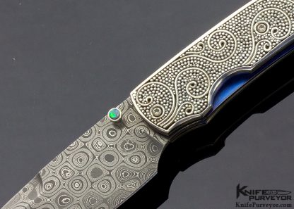 William Henry Custom Knife T12 Mardi Gras with Raindrop Damascus Carved Sterling Silver Beads and Wire-Work Scales and Opal Thumbstud - Image 2