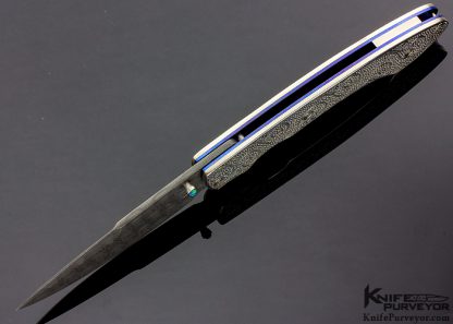 William Henry Custom Knife T12 Mardi Gras with Raindrop Damascus Carved Sterling Silver Beads and Wire-Work Scales and Opal Thumbstud - Image 4