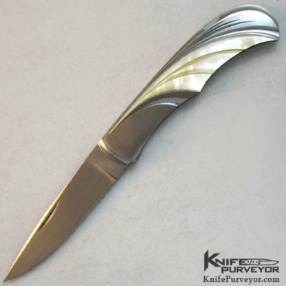 Wolfgang Loerchner Custom Knife Fluted Goldlip Pearl Lockback